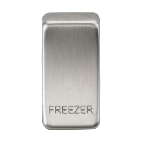 A stainless steel rectangular handle marked as Switch Cover "Marked FREEZER" is set on a sleek, brushed chrome surface.