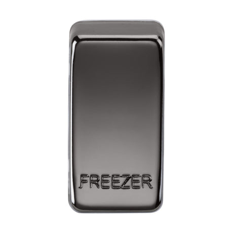 A rectangular object with rounded edges, marked "FREEZER" at the bottom, features a sleek chrome metallic finish in sophisticated Black Nickel. The smooth and shiny surface reflects light elegantly.