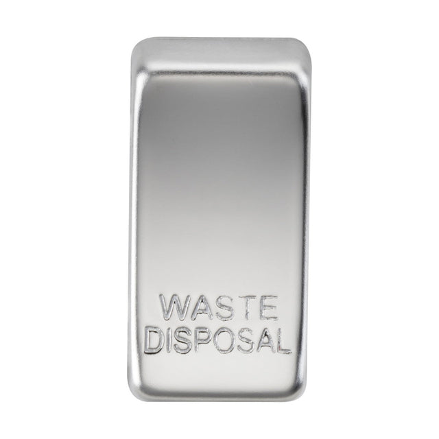 A close-up of the Switch Cover "Marked WASTE DISPOSAL" in polished chrome, featuring an engraved label. Its smooth, reflective design resembles interchangeable rocker covers, bringing a sleek elegance to any modern kitchen.