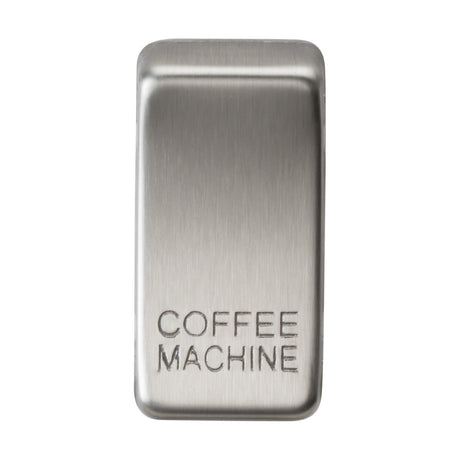 A brushed chrome switch cover, labeled "COFFEE MACHINE," features replaceable rocker covers and elegantly engraved lettering.