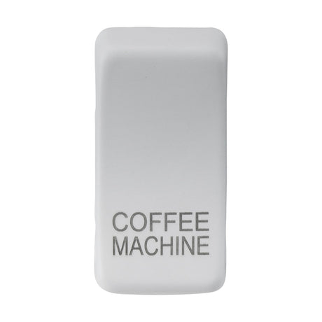 A matt white rectangular switch cover labeled "COFFEE MACHINE" in gray text, featuring durable ABS construction.