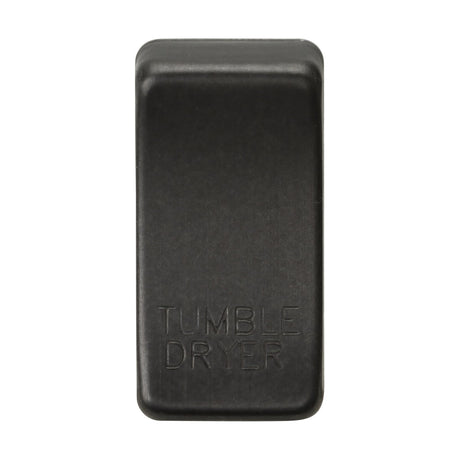 A rectangular black switch cover labeled "TUMBLE DRYER" showcases a smoked bronze finish with a smooth, matte texture.