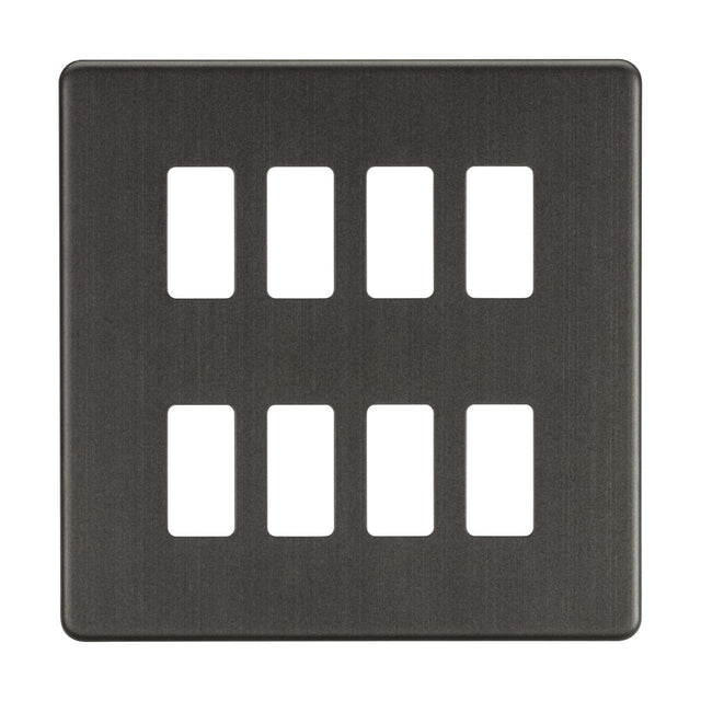 The Screwless 8 Gang Grid Faceplate in Smoked Bronze showcases eight rectangular openings, arranged in two rows of four, and boasts a brushed finish. Constructed from premium grade steel, this grid wall plate offers a sleek and modern aesthetic to any room.