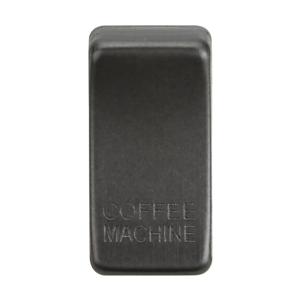 The Switch Cover "Marked COFFEE MACHINE" in smoked bronze has a rectangular shape and resembles a sleek rocker cover in both design and durability when viewed from above.