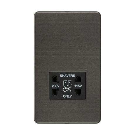 The 115V/Dual Voltage Shaver Socket in Smoked Bronze with a black insert and screwless design features a minimalist, dark, rectangular shape. It displays SHAVERS ONLY with a shaver graphic and dual voltage options of 230V and 115V.