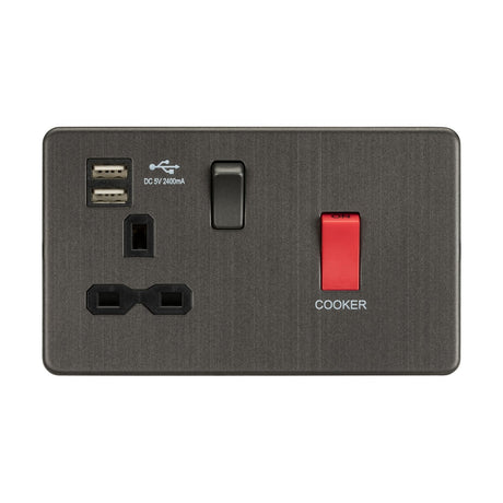 A close-up of the Screwless 45A DP Switch & 13A Switched Socket With Dual USB in smoked bronze highlights its sleek metallic plate featuring two plug outlets, two USB ports, and a red 45A switch labeled COOKER.