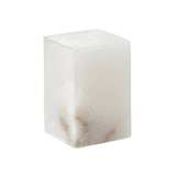 The Monvara 1 Light Small Monolith Alabaster Floor Lamp in Soft White showcases a rectangular, translucent alabaster block with delicate beige and brown veining, displayed against a plain white background.