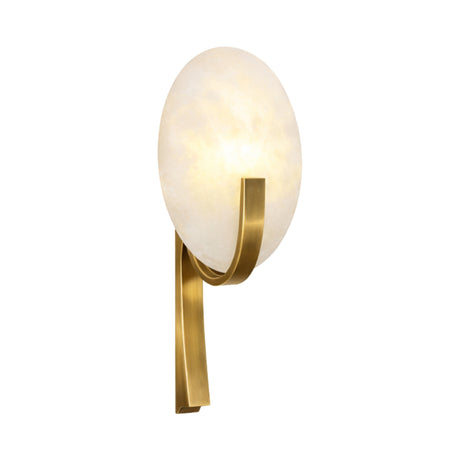 The Caldris 1 Light Disc Alabaster Wall Light features a round, soft white alabaster shade and a curved brushed brass arm and base, creating an elegant contrast against white walls.