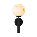 The Etoile 1 Light Sphere Alabaster Wall Light in soft white and matte black features a round, alabaster-patterned frosted globe and a sleek vertical base, shown against a white background.
