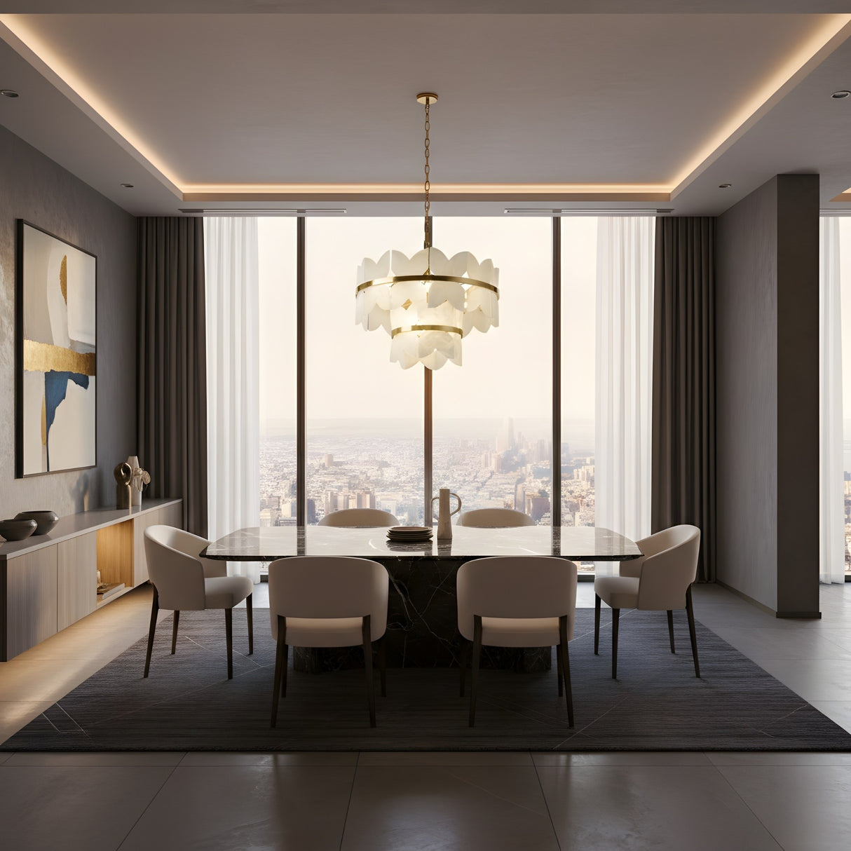 A modern dining room features a marble table, six white chairs, abstract wall art, and the Petraia LED 2 Tier Floral Alabaster Chandelier in brushed brass and soft white. Floor-to-ceiling windows showcase a city skyline view.