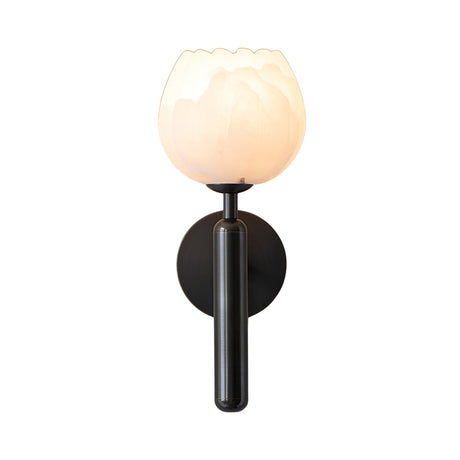 The Olivaro 1 Light Pedal Form Alabaster Wall Light features a soft white, tulip-shaped shade and matte black base, illuminated and mounted on a white background.