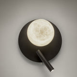 Halvessa LED dimmable wall light in black with a round backplate, glowing alabaster globe, and slim angled reading light, shown on a plain grey background.