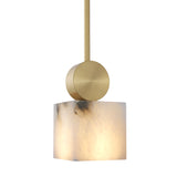 The Serano 1 Light Small Vertical Pillar Alabaster Pendant Light features a soft white cubed shade with natural veining, suspended from a brass fixture on a gold rod, set against a white background.
