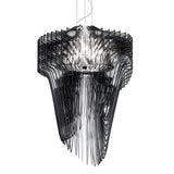 The Aeris 7 Light Extra Large Chandelier in black features sculptural, wavy panels encircling central lights, creating a dramatic and intricate design that stands out against a white background.