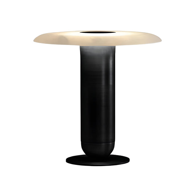 The Luxelle LED Single Tiered Alabaster Table Lamp in soft white and brass features a modern cylindrical base and a wide, flat, circular frosted white shade, shown against a plain white background.