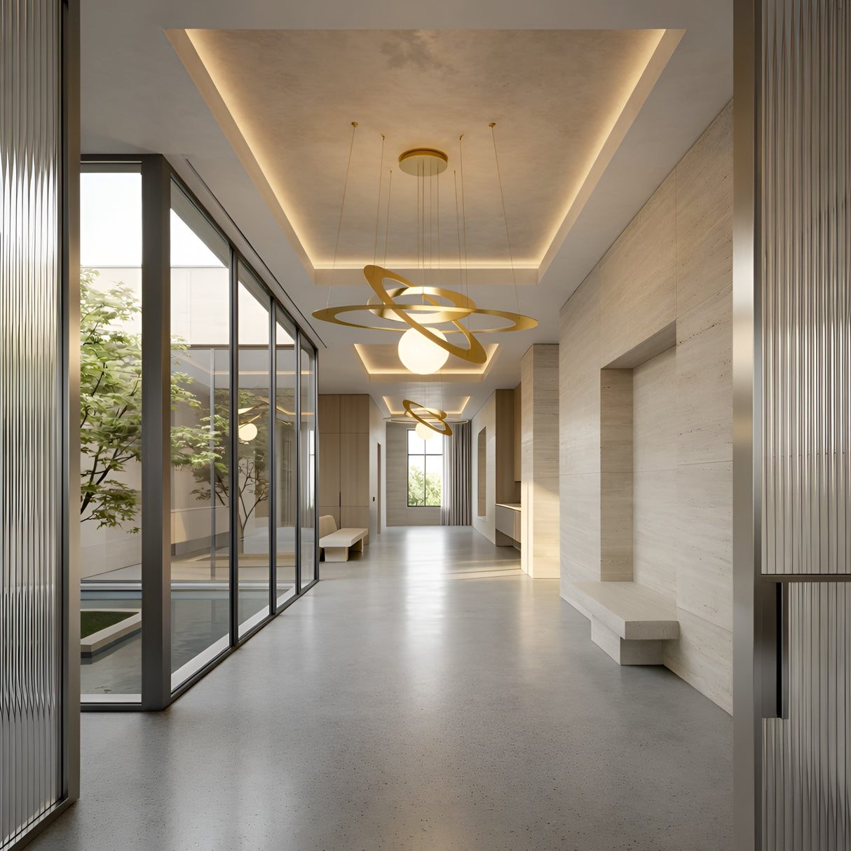 A modern hallway with beige walls, built-in benches, large windows opening to greenery, and a Universe LED Suspension Light - Matte Gold hanging from recessed ceilings for a bright, elegant touch.
