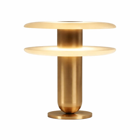 The Luxelle LED Double Tiered Alabaster Table Lamp in Soft White & Brass features a cylindrical gold base and dual circular shades, offering a sleek, minimalist look. When lit, it casts a warm, inviting glow.