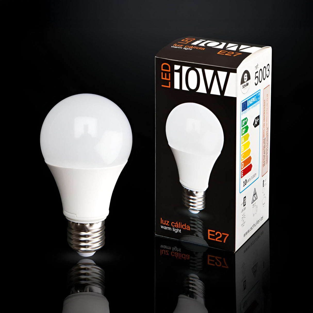 Schuller LED globe bulb 10W E27 with white opal finish beside its black and orange printed retail box on a reflective black background.