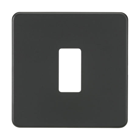 An anthracite rectangular light switch cover, designed with a central cut-out for a single toggle switch, features a screwless faceplate that offers a sleek and modern appearance with gently rounded corners. Made from premium steel, the finish is smooth and matte.