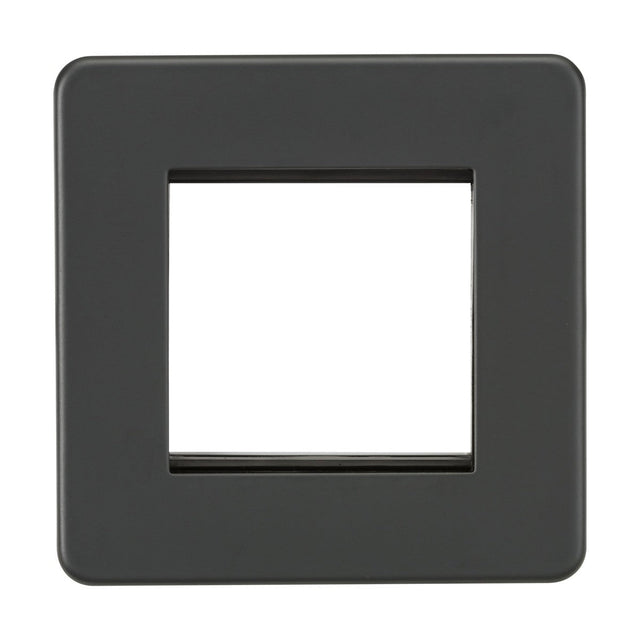 The 2 Gang Modular Faceplate - Anthracite (Screwless) is a black, square frame ideal for custom electrical installations like switches or outlets. Its sleek design features a screwless design, smooth edges, and a matte finish.