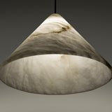Fuji LED Alabaster Pendant Light with a cone-shaped white alabaster shade showing grey veining, illuminated from within, hung on a slim black cord.