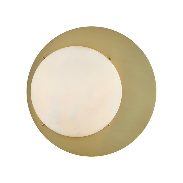 The Lunara 1 Light Round Alabaster Wall Light – Brushed Brass features a large white alabaster center on a brushed brass disk, creating eye-catching decorative lighting against white walls.