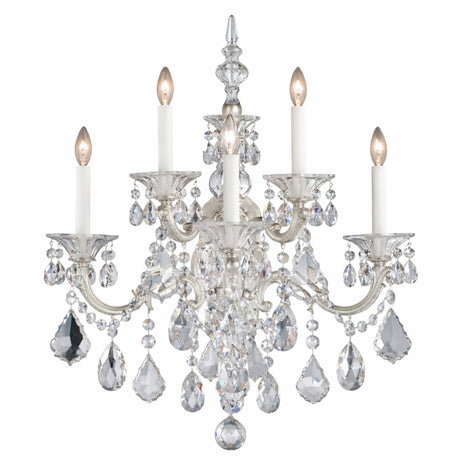 The Vienna 5 Light K9 Crystal Chandelier features five candle-style arms, ornate silver accents, and teardrop-shaped K9 crystal pendants, all beautifully illuminated for a sparkling effect.