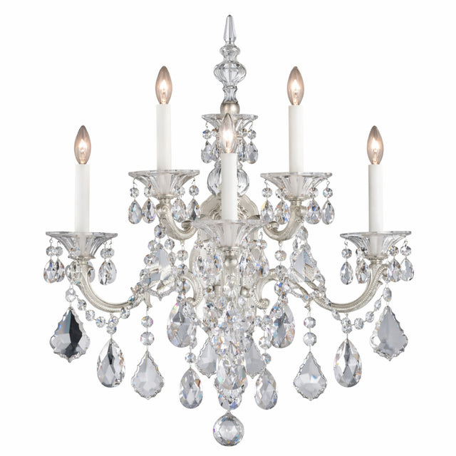 The Vienna 5 Light K9 Crystal Chandelier features five candle-style arms, ornate silver accents, and teardrop-shaped K9 crystal pendants, all beautifully illuminated for a sparkling effect.