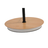 A close-up of the Ex-Display Ginger LED Floor Lamp - Black & Oak base, featuring a round oak-finished top, white edge, and central black pole—an ideal modern design accent.