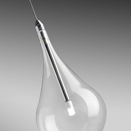 Close-up of the Yarvelle glass pendant light showing a clear teardrop-shaped shade with a slim chrome holder and G4 bulb, set against a grey background.