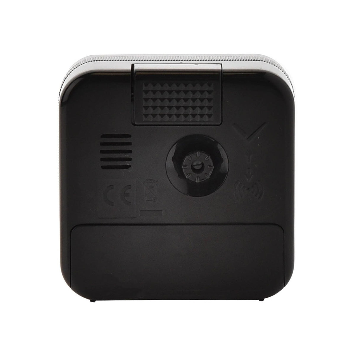 Rear view of the square black plastic alarm clock, showing the top snooze/shut-off button, rear speaker grille, control dial, battery compartment, and CE marking, on a plain white background.