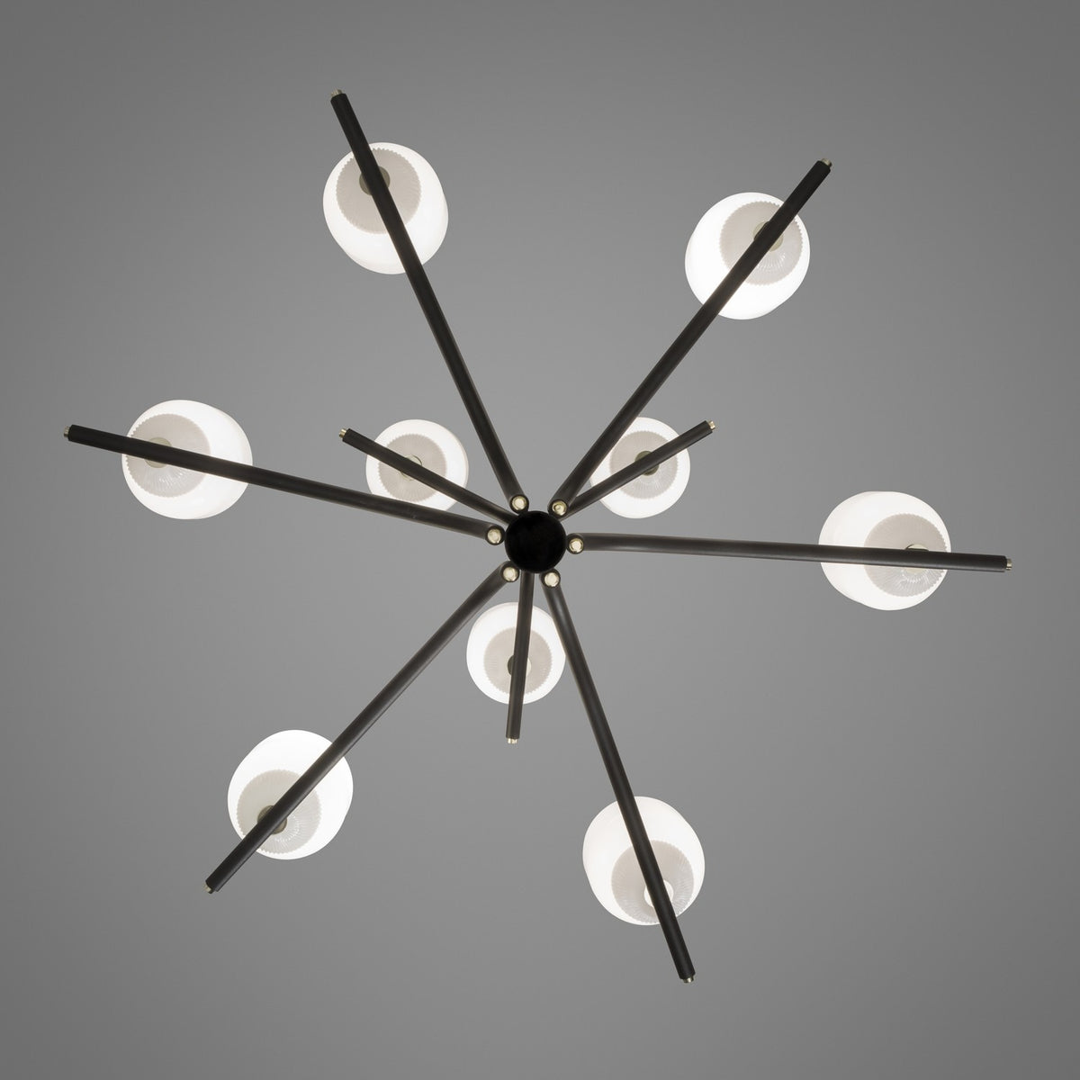 Faronne 9 Light Glass Chandelier in black, viewed from below, with slender arms radiating from a central hub to nine opal glass barrel shades, set against a plain grey background.