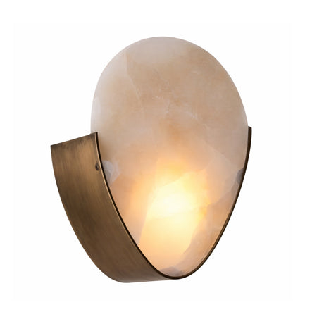 The Calera LED Large Oval Alabaster Wall Light features a softly illuminated smooth oval shade set in a sleek soft white and brushed brass frame.