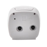 Rear view of the Cushion Silent Sweep Crescendo alarm clock in white plastic, showing a fold-out stand, battery compartment, and light/snooze button, on a plain white background.