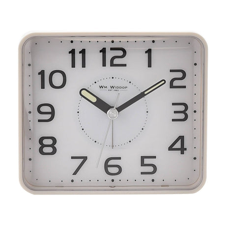 White plastic rectangular alarm clock with bold black Arabic numerals, dark hour and minute hands with pale glow tips, slim silver second hand, shown on a plain white background.
