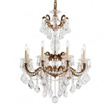 The Vienna 8 Light K9 Crystal Chandelier features heirloom gold accents, eight candle-style lights, and hanging crystal droplets, displayed against a white background.