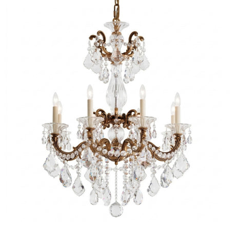 The Vienna 8 Light K9 Crystal Chandelier features heirloom gold accents, eight candle-style lights, and hanging crystal droplets, displayed against a white background.