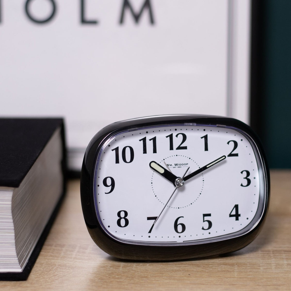 Oval Silent Plastic Alarm Clock with Light and Snooze - Black