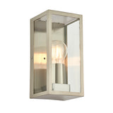 Endon Castwick box lantern wall light in brushed silver steel with clear bevelled glass panels and a single E27 filament bulb, on a white background.