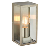 Endon Castwick box lantern wall light in brushed silver steel with clear bevelled glass panels and a single E27 filament bulb, on a white background.