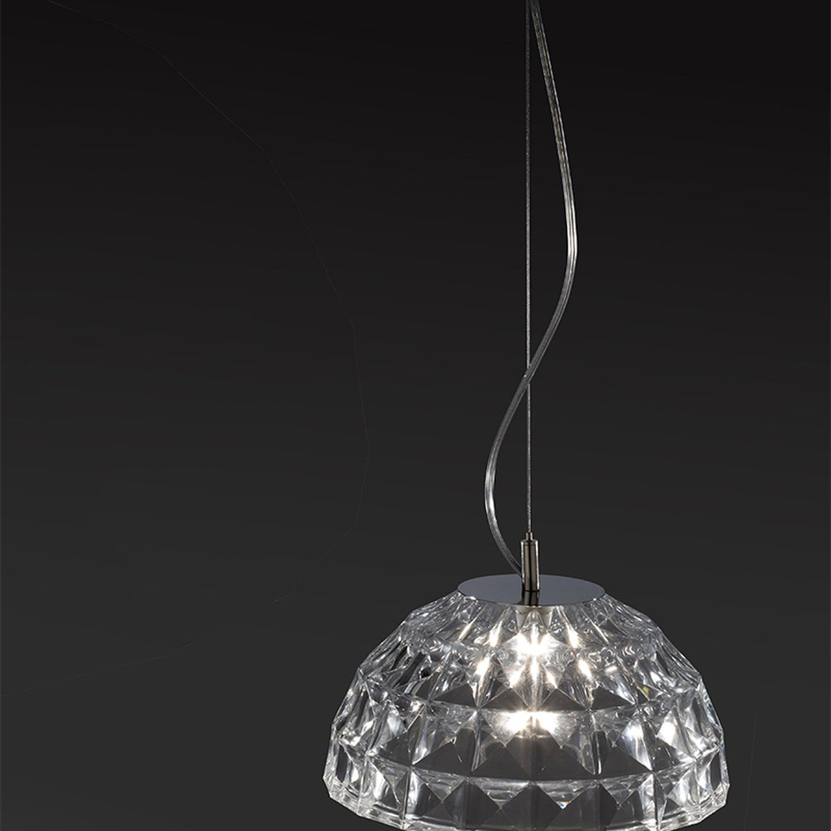 Deco Crystal Pendant Light in chrome, featuring a single faceted dome-shaped crystal shade on a slim curved cable, shown illuminated against a dark background.