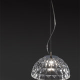 Deco Crystal Pendant Light in chrome, featuring a single faceted dome-shaped crystal shade on a slim curved cable, shown illuminated against a dark background.