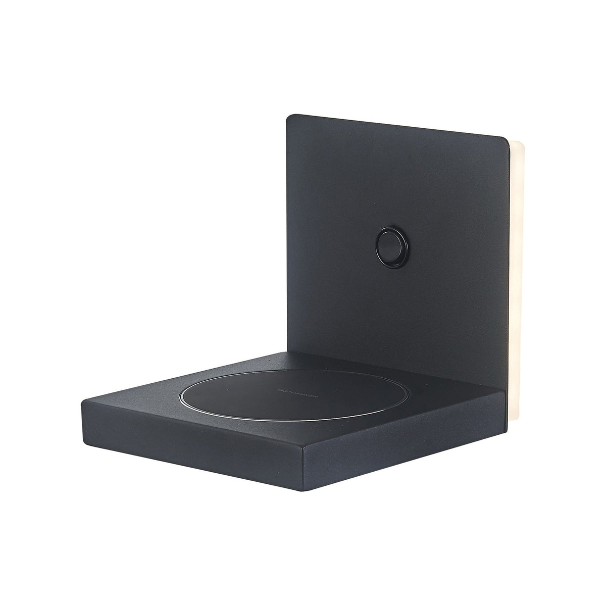 Zanzibar LED wall light in sand black, square matt metal faceplate with backlit edge glow, circular push switch, and integrated wireless phone charging shelf below, shown on a plain white background.