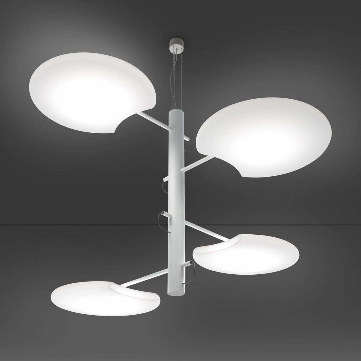 SuperMoon LED 4 Light Pendant Light in white, with a slim vertical stem, staggered arms, and round crescent-cut disc shades, shown against a dark grey background.