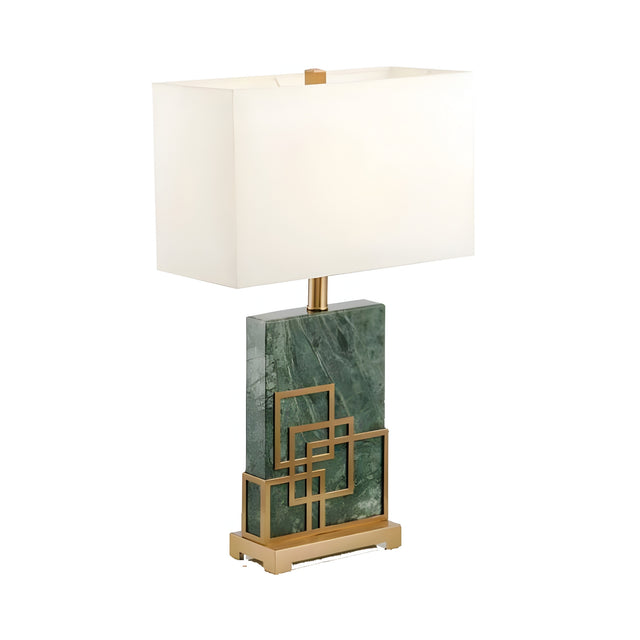 The Veridan 1 Light Framed Marble Table Lamp - Brass & Green features a rectangular white shade, a green marble base, and gold geometric accents, all set on an elegant brass stand.