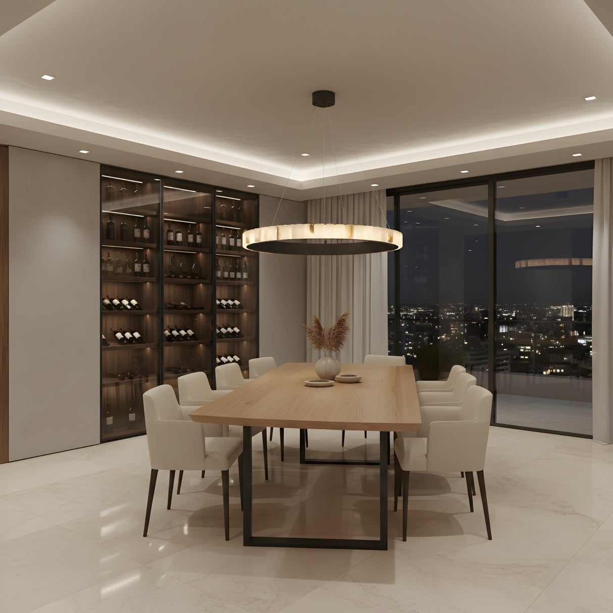 A modern dining room featuring a wooden table, eight white upholstered chairs, a Lucenza LED Small Halo Ring Alabaster Chandelier in matte black & soft white, a wall-mounted wine rack, and floor-to-ceiling windows with city night views.