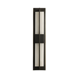 The Caldera LED Large Split-Core Alabaster Wall Light features a modern vertical matte black frame with a soft white panel, showcasing sleek minimalist design against a plain white background.