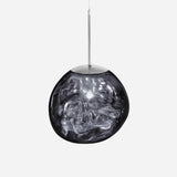 The Ex-Display Lava Small Pendant Light - Silver showcases a round, smoky glass shade with swirling patterns, elegantly suspended from a sleek silver rod, perfect for adding modern style to any space.