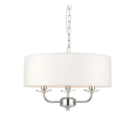 Endon Castdon 3 light pendant with nickel arms, K9 crystal detailing and a wide vintage white faux silk drum shade, on a plain white background.