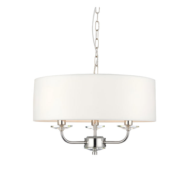 Endon Castdon 3 light pendant with nickel arms, K9 crystal detailing and a wide vintage white faux silk drum shade, on a plain white background.